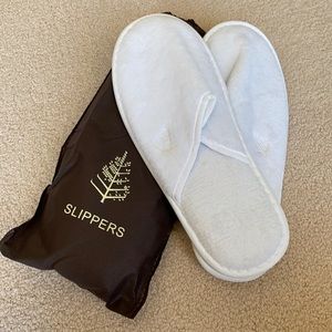 2 pairs of Four Seasons slippers. Never used.